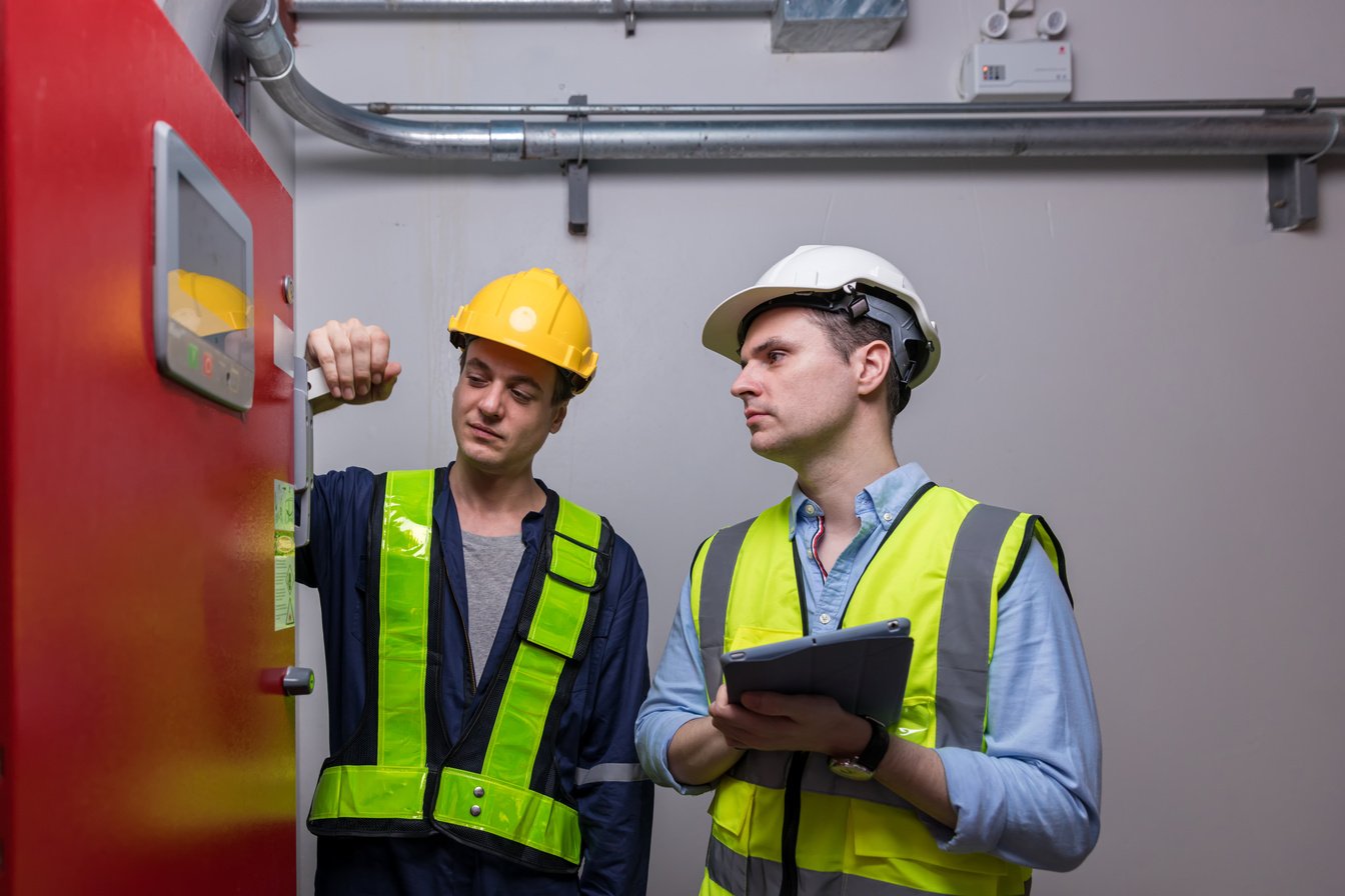 Engineer or technician work checking Fire suppression system and fire equipment.