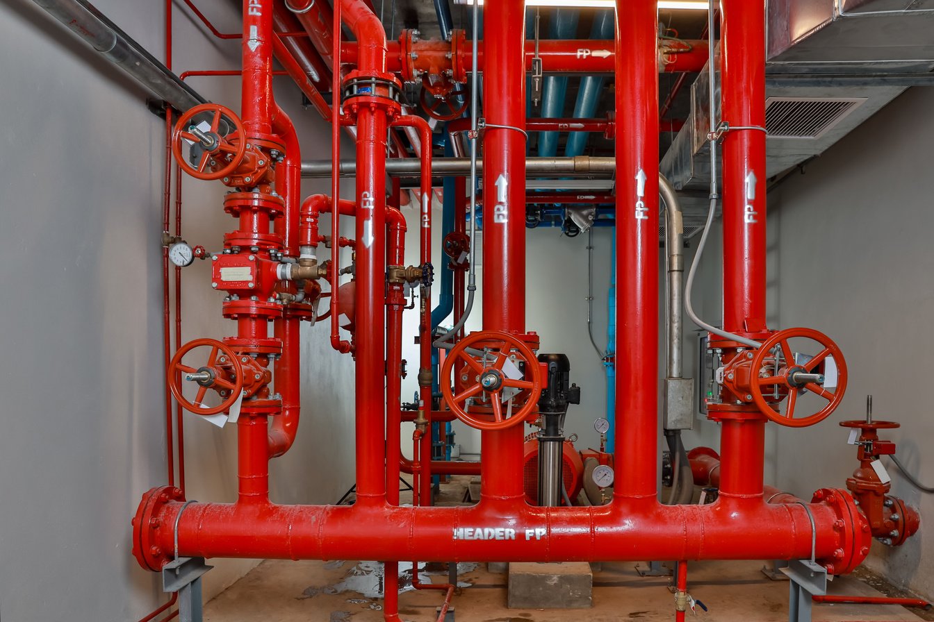 Room Fire suppression system installation with a alarm check valve. Fire suppression system and fire equipment Room.